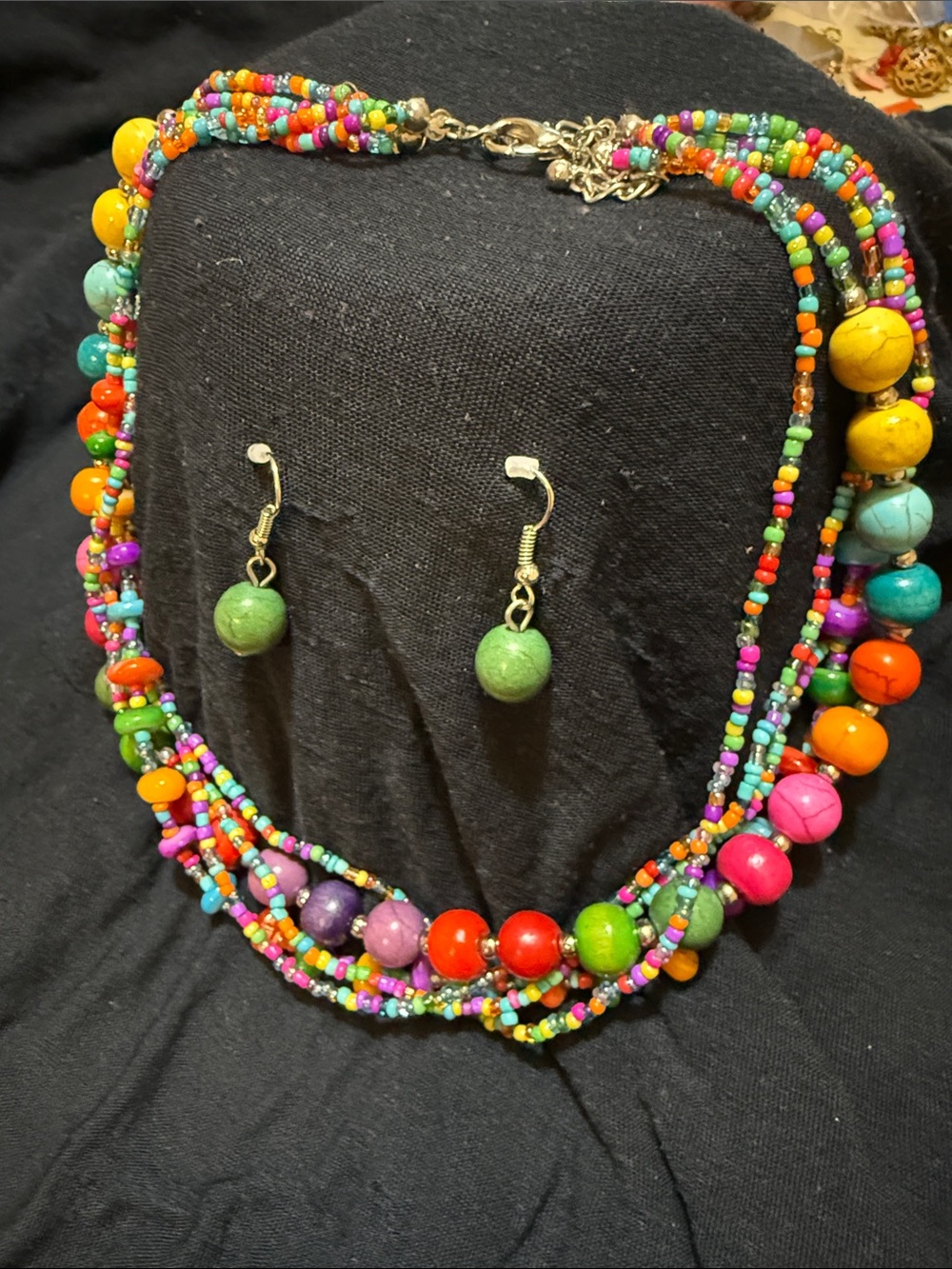 Multi colored & strand combo of glass wood & stone beads. Green pair of earrings